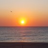 Sole al tramonto sul mare.
